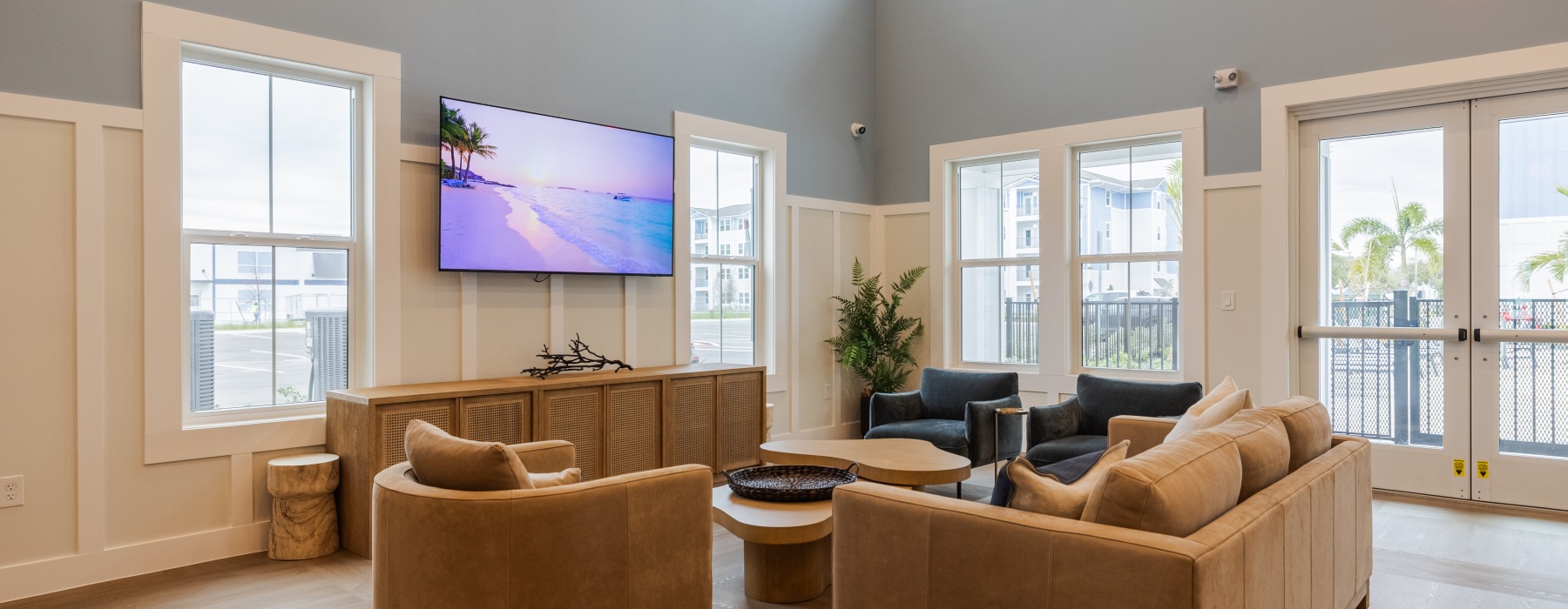 Clubroom of Madison Midtown, a modern apartment complex in Melbourne FL offering 1-, 2-, and 3-bedroom apartments.